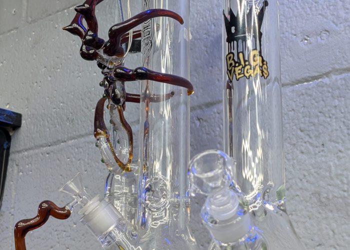 Clear American glass scorpion water pipe in store.